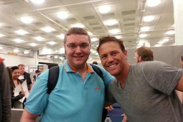 Dean Hill, left, with actor Brian Krause.