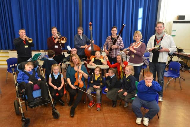 Members of the Royal Philharmonic Orchestra visit Sunningale School.