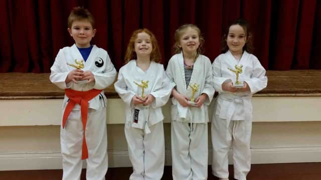 Eastlea Karate Club Students of the Year James Johnson, Evie Jeffrey, Olivia O'Neil and Maisy Milburn.