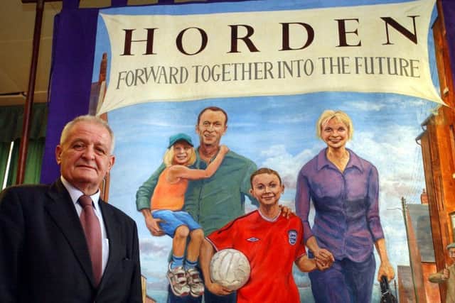John Cummings MP photographed in 2003 as he helped unveil a new banner for Horden.