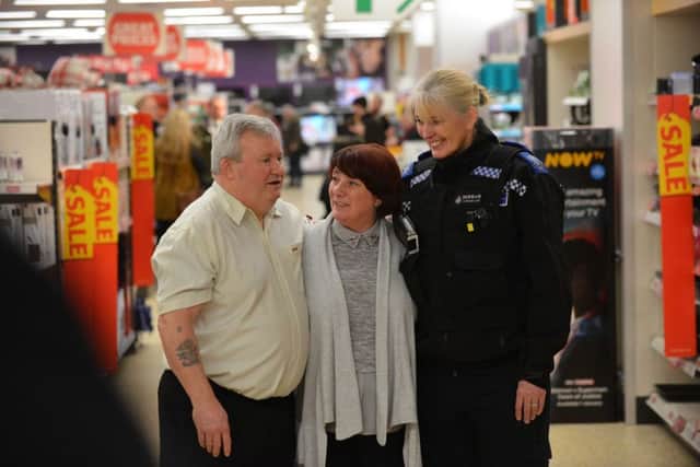 ainsbury shopper Catherine Maguire whose life was saved in-store on Christmas Eve. First on the scene off duty paramedic Steven Tate and PCSO Debbie Sadler-Knox