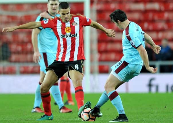 Jack Rodwell competes against Burnley's Joey Barton in Saturday's FA Cup tie. Picture by Frank Reid