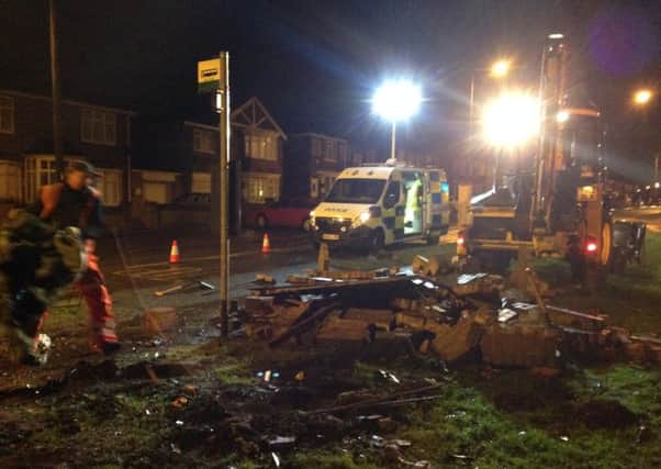 Council workers help police clear the scene after the fatal collision on Salter's Lane, Shotton Colliery.
