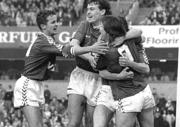 Warren Hawke (left) helps celebrate Eric Gates' opener for Sunderland in the 1990 play-off semi-final second leg win at Newcastle