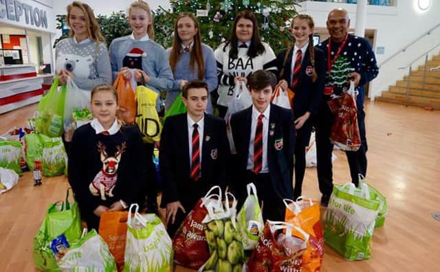 Students with bags of food collected at  at The Academy at Shotton Hall.