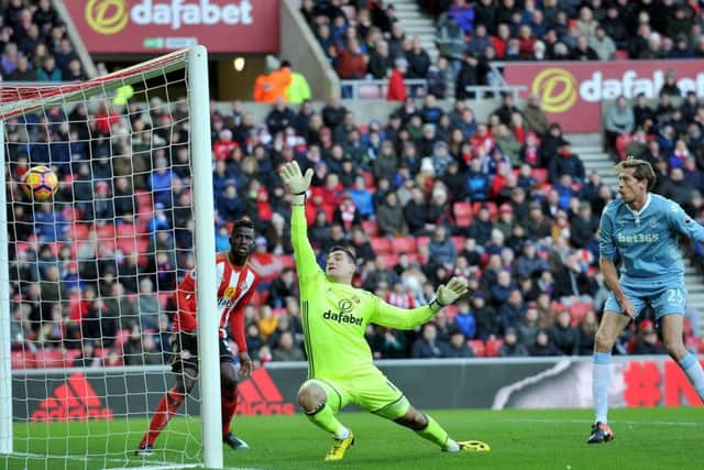 Sunderland keeper Vito Mannone can only watch despairingly as Stoke's opening goal hits the back of the net. Picture by Frank Reid