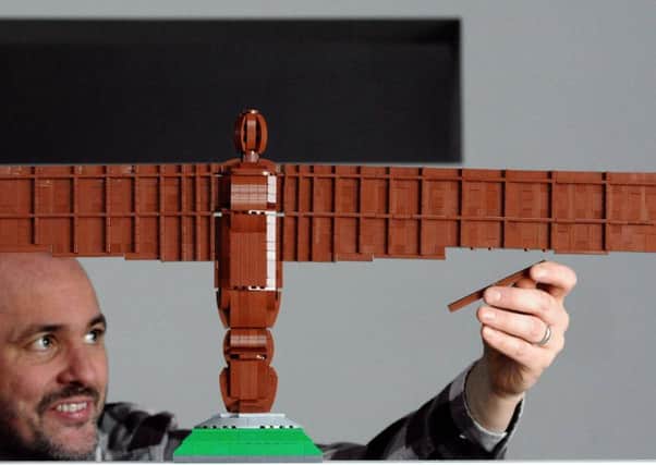 Master LEGO builder Steve Mayes adds finishing touches to his model of the Angel of the North.