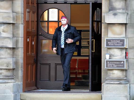 Mark Hardy leaves Sunderland Magistrates Court wearing a mask after an earlier court appearance