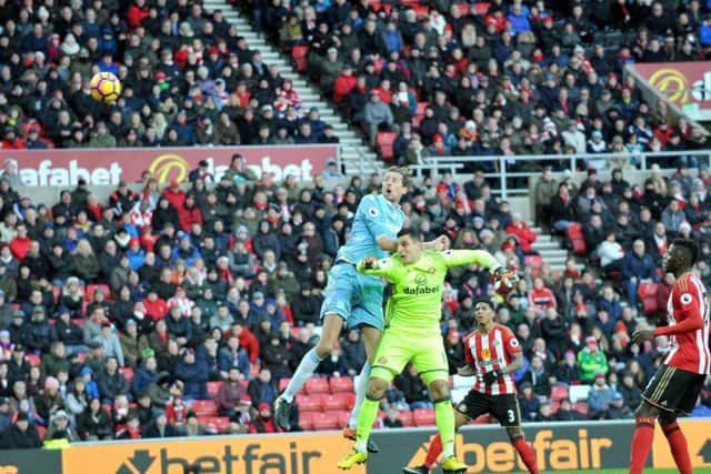 Peter Crouch heads in Stoke City's third goal at the Stadium of Light. Picture by FRANK REID