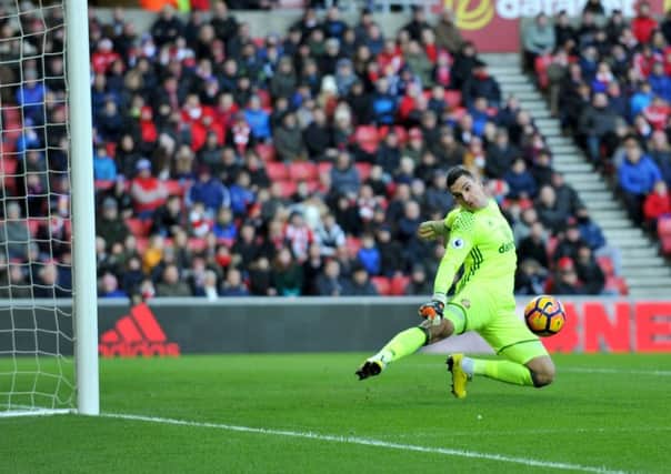 Vito Mannone saves from Marko Arnautovic, only to be beaten by the rebound. Picture by FRANK REID