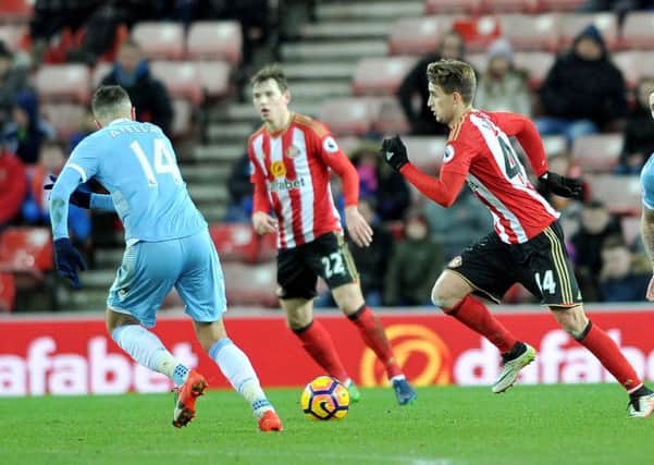 Adnan Januzaj in a rare moment of attacking intent against Stoke. Picture by FRANK REID