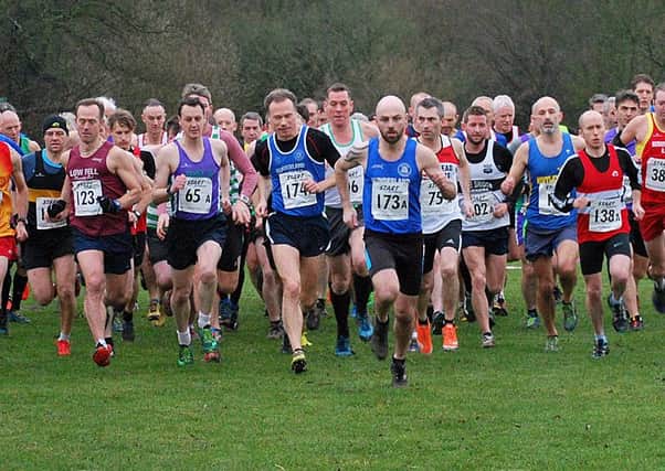 Start of the veterans relay in the Durham Cathedral Relays at Maiden Castle. Ian Dixon (173) led the field home and set Sunderland Harriers on the way to victory.