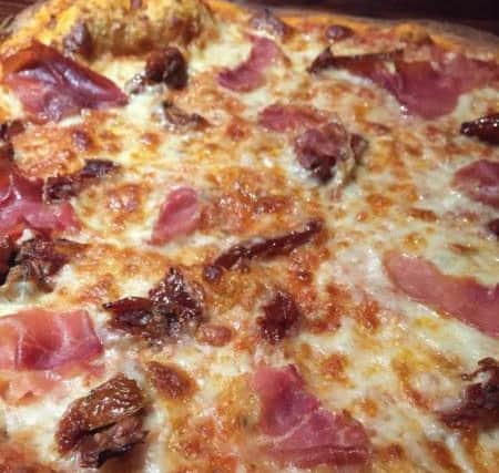 The Naples Pizza with added ham.
