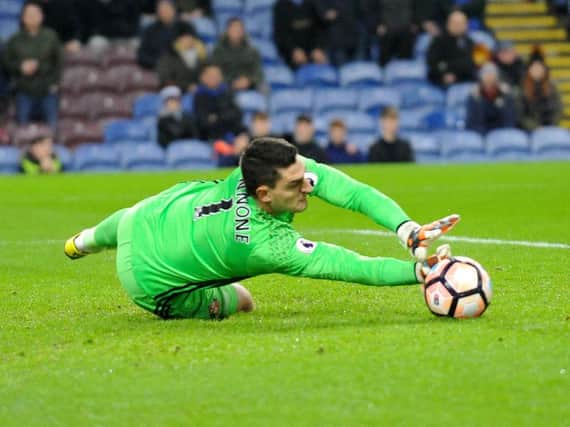 Vito Mannone saves from Joey Barton. Picture by FRANK REID