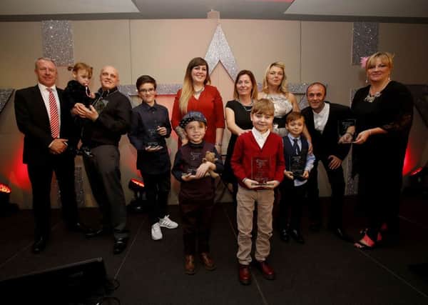 Children of Courage receive their awards.