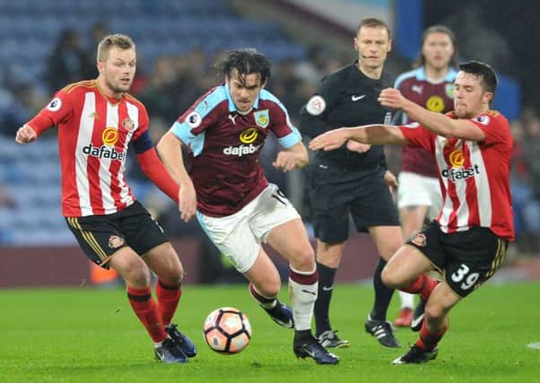 Sunderland midfielders Seb Larsson and George Honeyman (right) combine to challenge Joey Barton in Tuesday night's FA Cup defeat at Burnley. Picture by Frank Reid