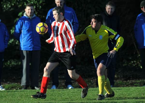 Wearmouth Old Boys battle Durham County (yellow) in the Over-40s League last week. Picture by Tim Richardson