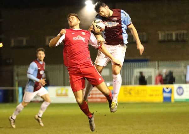 South Shields new boy Iulian Petrache wins a header in the midweek cup win over Penrith, but now starts a suspension