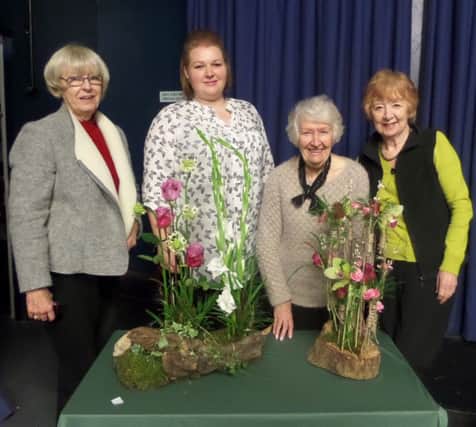 Members of Sunderland Floral Art Club Carol, Gloria and Sheila with Rebecca Hough, from Peterlee, following the very enjoyable demonstration entitled Woodland Wonders.