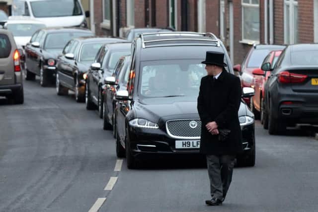The cortege arrives for the funeral of former Easington MP John Cummings.