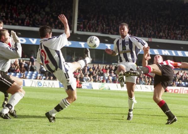 Acrobatic: Kevin Ball twists to hit Sunderland's winner in a dramatic clash at The Hawthorns in 1998. Picture by Kevin Brady