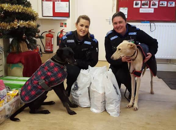 Peterlee Neighbourhood Policing Team with Hector and Jake at Stray Aid.