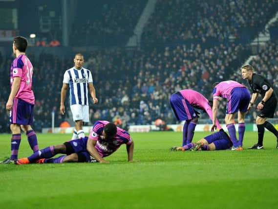Victor Anichebe is injured against West Bromwich Albion