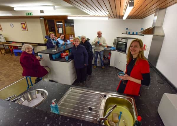 Rev  Kate Boardman (right) of St Mark & St Cuthbert Church, with members in their new kitchen area