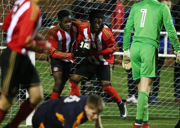 Joel Asoro (left) and goalscorer Josh Maja rush to get the ball back after Sunderland cut the deficit to one goal in last night's FA Youth Cup tie. Picture by Tom Banks