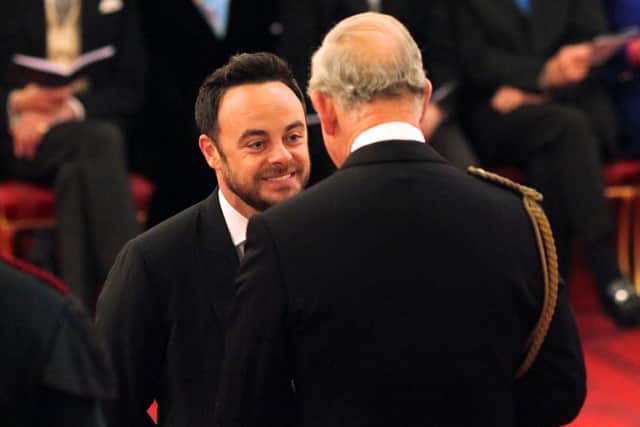 TV presenter Ant McPartlin is made an OBE by the Prince of Wales during an Investiture ceremony at Buckingham Palace. Pic: PA.