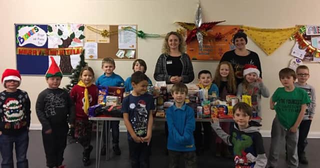1st Peterlee  Beavers with some of the food they have collected for the FEED project.