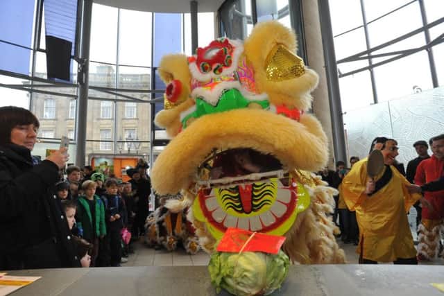 Chinese New Year celebrations at Sunderland's Museum and Winter Gardens, the lion dance performed  by martial arts club Moi Fa.