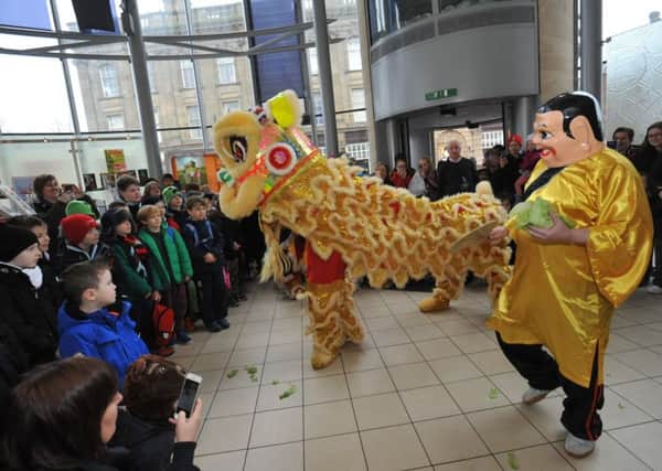 Chinese New Year celebrations at Sunderland's Museum and Winter Gardens, the lion dance performed  by martial arts club Moi Fa.