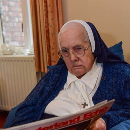 Sister Mary Benedict of the Oaklea Convent, Tunstall Road, Sunderland, who celebrated her 100th birthday on the 27th of January, pictured reading her Sunderland Echo