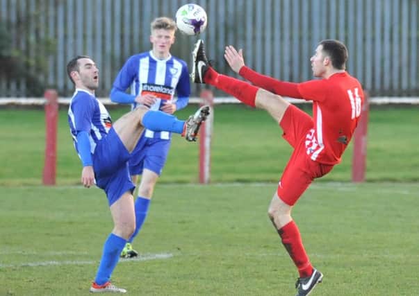 Ryhope CW (red) take on Whitley Bay on Saturday. Picture by Tim Richardson
