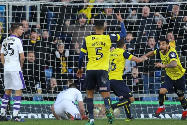 Sheer delight: Oxford United striker Kane Hemmings (right) celebrates putting his side ahead against the Magpies on Saturday. Picture by Gareth Williams/AHPIX.com