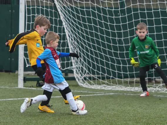 Action from the Russell Foster Youth League.