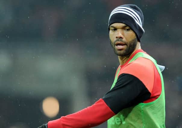 New centre-back arrival: Joleon Lescott warms up ahead of Tuesday nights home 0-0 draw with Spurs. Picture by Frank Reid