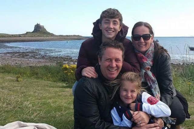 John with daughter Jennifer, son Jon, and wife Claire.