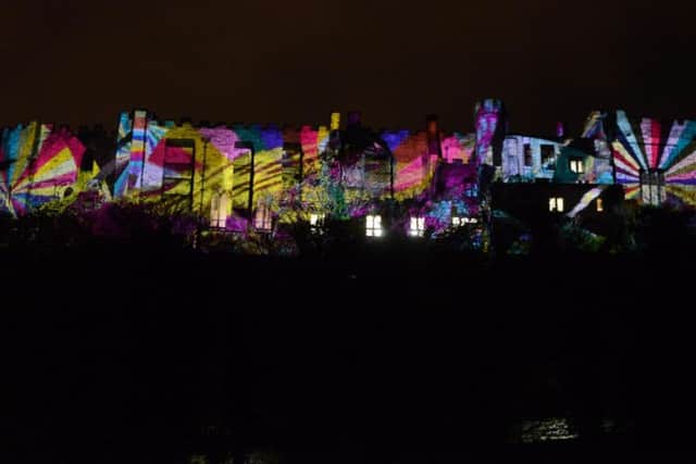 Durham Castle lit up during 2015's Lumiere.