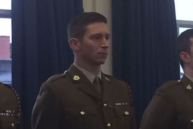 Jon Miller at his promotion ceremony