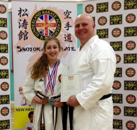 Lucy Dixon and instructor Derek Laing, of Sunderland Karate Club.