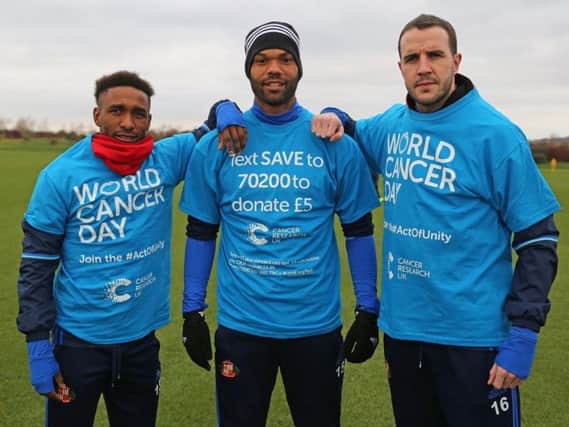 Sunderland players Jermain Defoe, Joleon Lescott and captain John O'Shea give their backing to World Cancer Day.