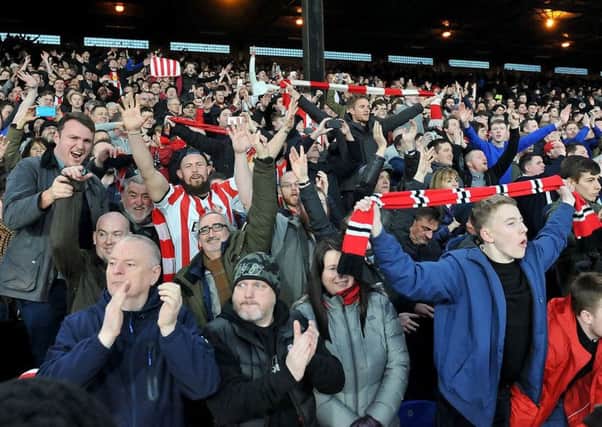 Sunderland fans celebrate after today's win at Palace. Picture by Frank Reid