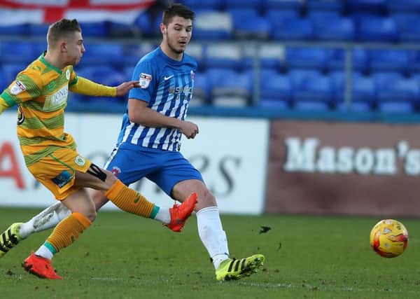 Pools' Brad Walker tracks Yeovil's Ben Whitfield.  Picture by Tom Banks