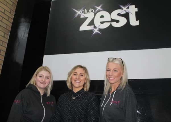 Club Zest owners Holly Donaldson, left, and Jennie Moyse, right, are joined by entrepreneur Katie Bulmer-Cooke at the re-opening of the gym.