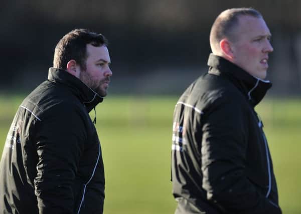 Washington's new management team of James Clark (left) and assistant manager Michael Laws survey the scene in last week's draw at home to Guisborough.