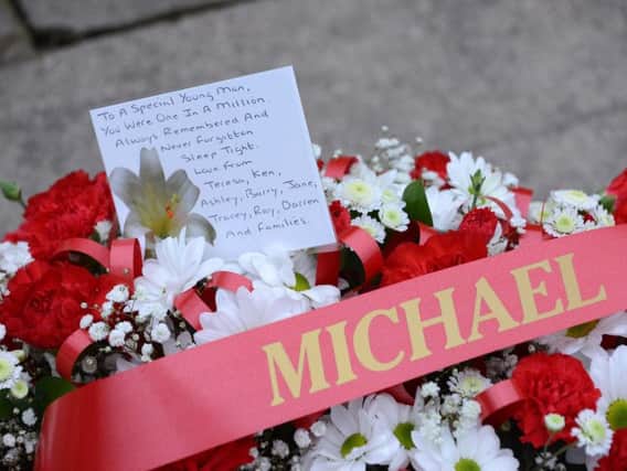 Flowers left in memory of Michael.