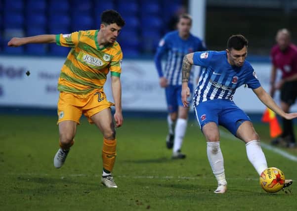 Hartlepool United's Nathan Thomas takes on Yeovil's Liam Shephard (left) in last week's 1-1 draw. Picture by Tom Banks