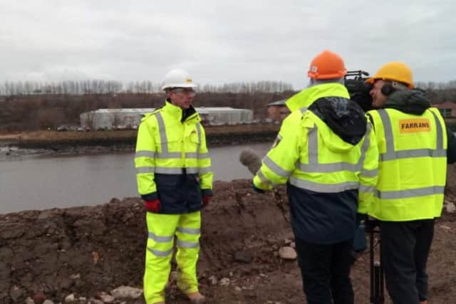 Project director Stephen McCaffrey is interviewed about the pylon raising
